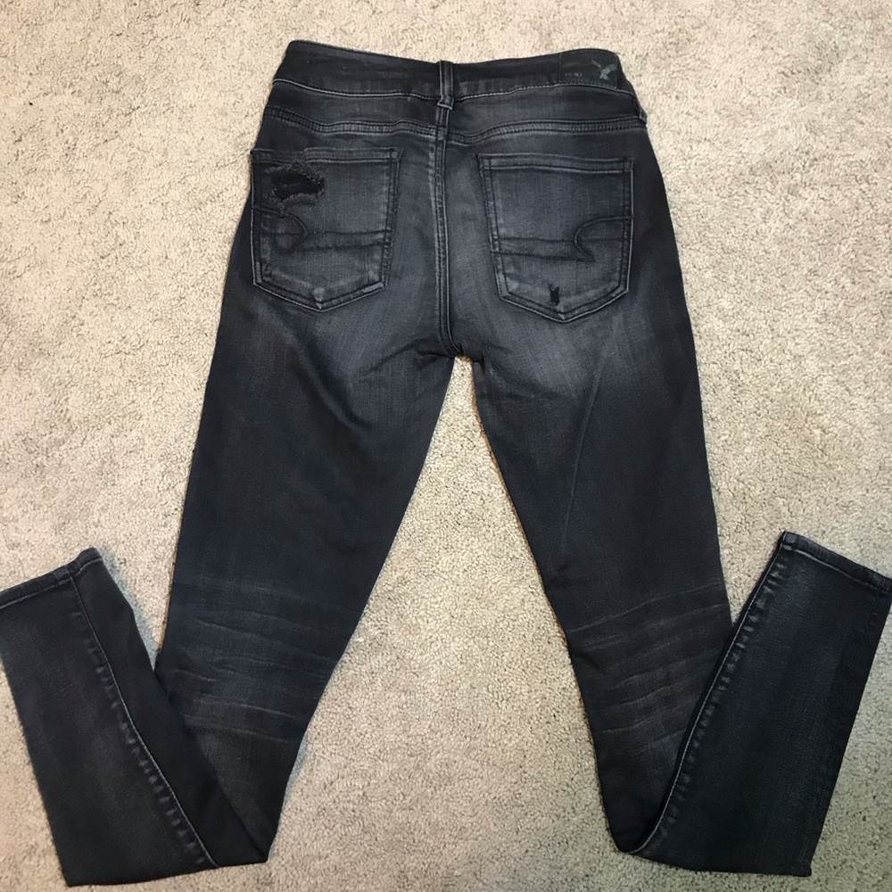 black ripped jeans